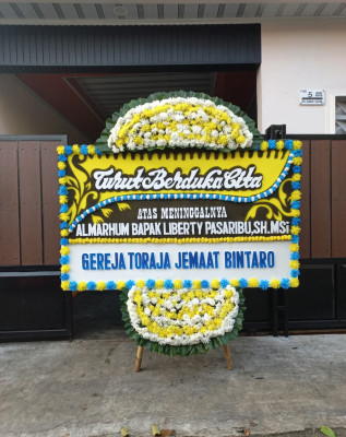 Papan Bunga Duka di Merdikorejo